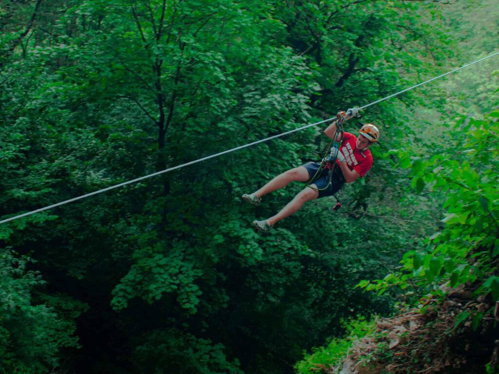 Epic Ziplining Through Wooded Area